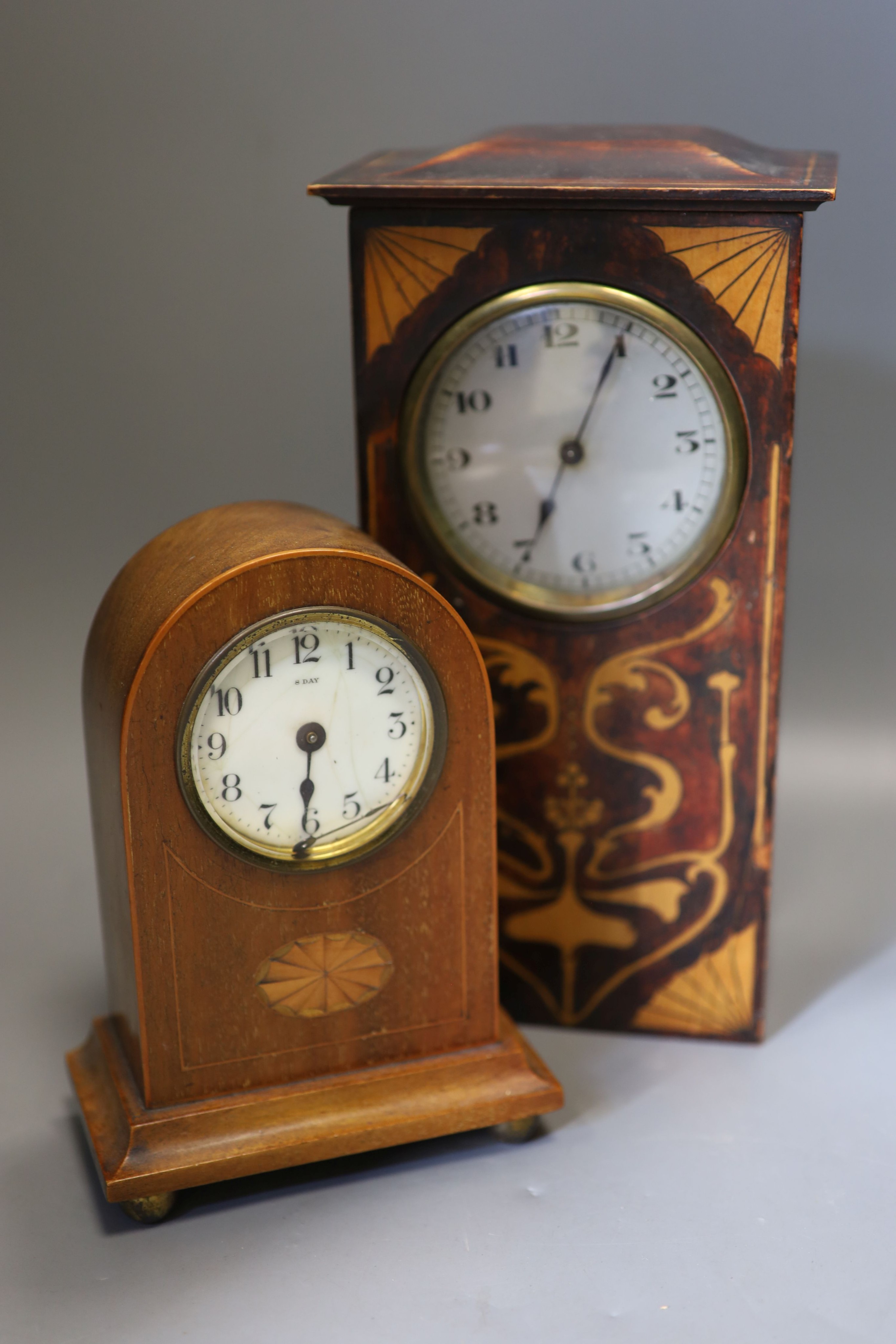 An Art Nouveau timpiece and small inlaid mantel clock 26cm